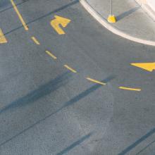 Road with yellow arrows